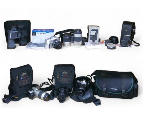 A collection of 35mm cameras and lens, including Pentax, Fujifilm, Minolta, and a pair of Pentax binoculars.