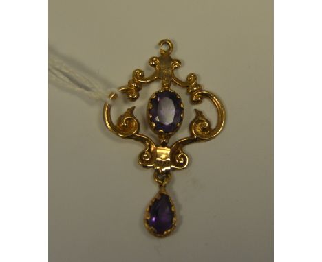An Art Nouveau amethyst and 9ct gold mounted pendant, 3g