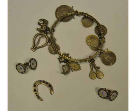 A pair of silver, enamel and mother of pearl earrings; a silver horseshoe charm; a bracelet mounted with Victorian silver coi