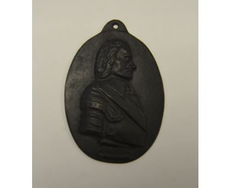A cast iron portrait plaque, marked to verso Salop