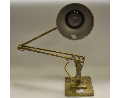 A vintage Herbert Terry & Sons angle poise lamp, scumble painted in gold and cream