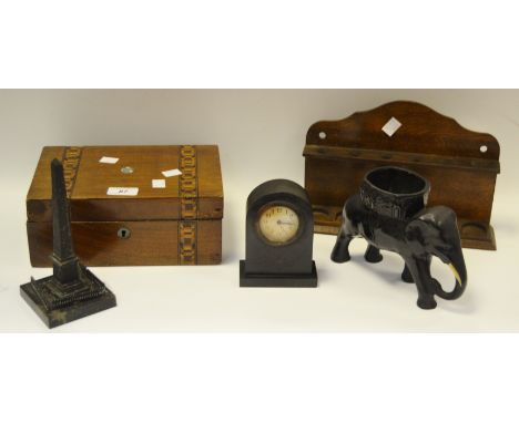 A Victorian walnut and Tumbridge banded jewellery box c.1870; an oak pipe rack; an Ashford black marble arched mantel clock; 