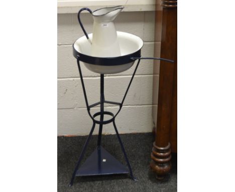 A French enamel wash bowl and jug stand, painted blue 