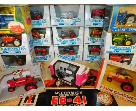 Ertl die cast vintage tractors, including a Massey Harris 44, English Fordson, Alios, Chalmers model C, a Belarus boxed tract