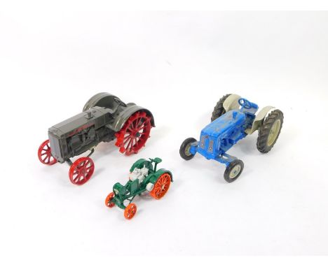 An Ertl type model Fordsen tractor, another case marked 0790 and a smaller vintage tractor, (3).