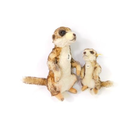 A Steiff Meerkat Cockie, with label to the ear, neck and with further label, 22cm high and another larger 071249. (2)
