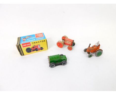 Die cast agricultural vehicles, comprising an Animate Toy baby tractor, clockwork Minic caterpillar, tractor with rider, a Lo