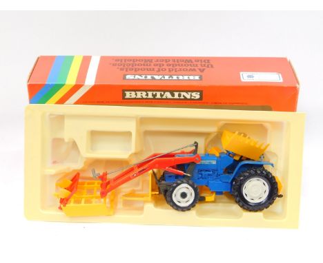 A Britains die cast Ford tractor with loader, TW-20 9584, boxed.