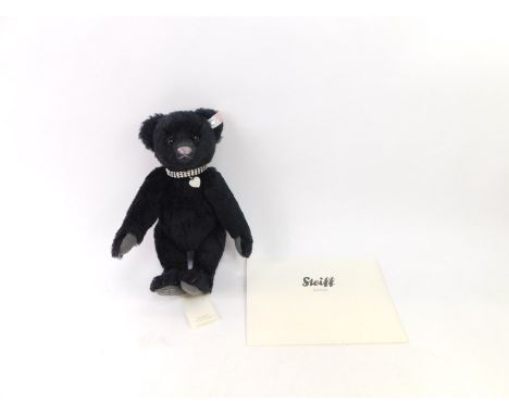 A Steiff Swarovski bear Krystina exclusive for the Danbury Mint, in black, with growl action, elaborate heart collar and rhin