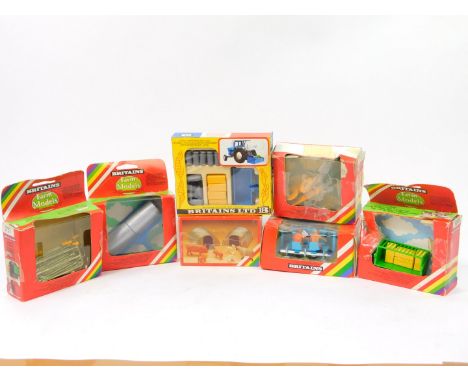 Britains die cast farm implements, to include a potato planter 9541, animal shelters 4703, roller 9549, tipping transporter a