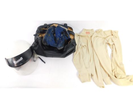 A Cromwell competition motorcycle helmet, fibre glass size 3, together with a holdall containing a pair of RRS shoes and an R