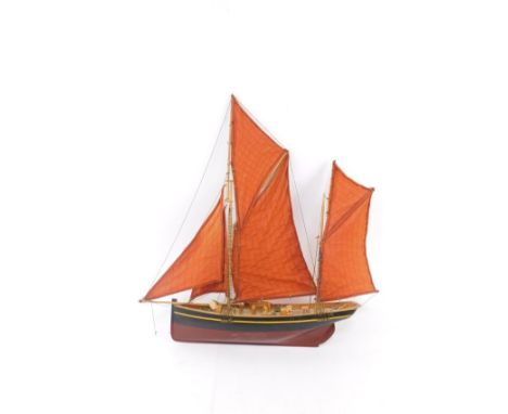 A wooden scale model of a Thames Barge, oval plate to the stern marked Hanah, 59.5cm wide. 