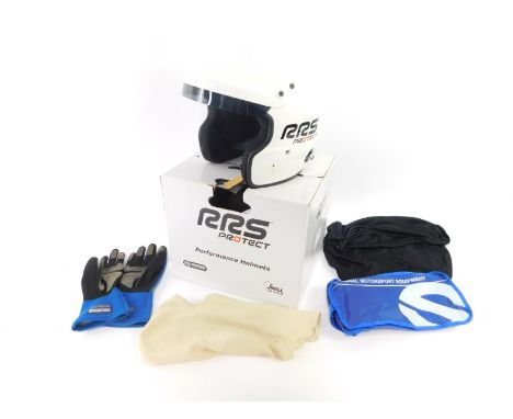 An ARS fibreglass rally helmet, open face, Snell-SA2010, FIA8858-2010, with fabric cover, together with a pair of Sparco car 