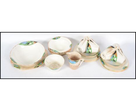 A vintage 1930s art deco Wedgwood hand painted and transfer printed 6 person tea service and dessert set consisting of 6 trio