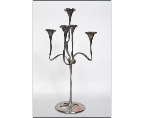 A stunning silver plated believed Danish large candelabra in the form of a tree. The tree with multiple sconces all on shaped