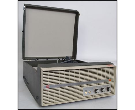 A 1960's retro two tone Murphy Type A852G record player having an inset BSR record deck. The portable record player recently 