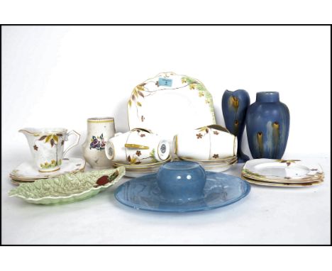A collection of ceramics to include a hand painted Longton Art Deco part tea service together with a Carlton Ware dish, studi