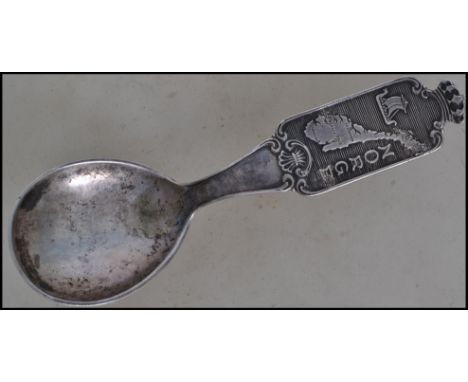 A 930 marked silver Scandinavian caddy spoon marked Norge. Length 13cms / weight 26.8g