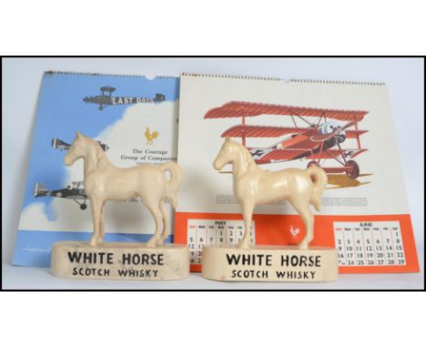 Breweriana a pair of pottery White Horse Scotch Whisky point of sale advertising models measuring  22cm tall. Together with t