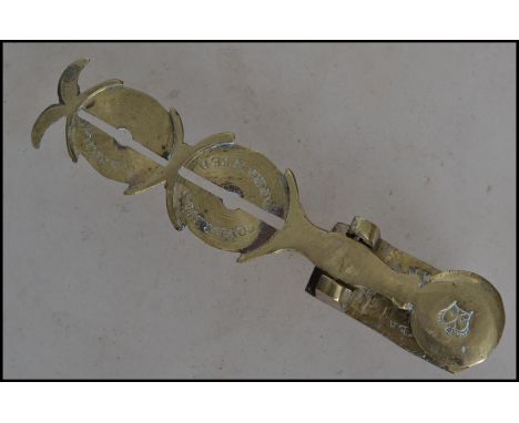 A set of Victorian 19th century brass sovereign scales having impressed notation. Measures: 10cm long. 