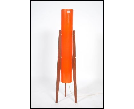 A 1970's retro teak atomic rocket lamp being raised on tapering supports with vibrant cylinder shade ( af )