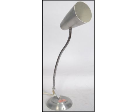 A rare and original mid century Terence Conran Mac desk Lamp of brushed and polished steel construction. Conical shade on goo