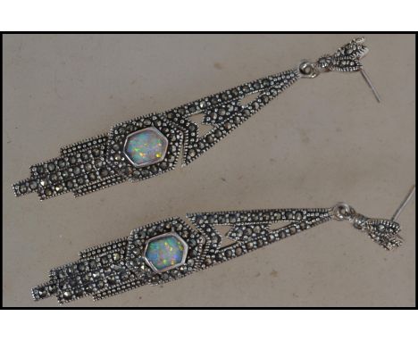 A pair of silver Art Deco style marcasite opal drop earrings complete in the presentation case. Total weight 9g/ size 6.5cms 