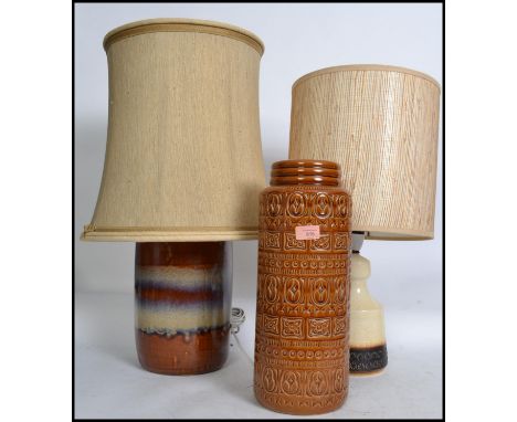 A 1970's retro large West German Fat Lava style ceramic table lamp of baluster form together with another similar and a West 