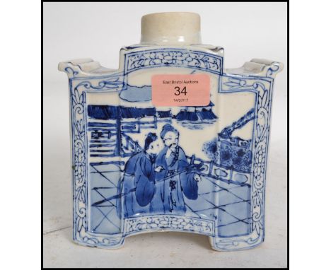 A 19th century Chinese blue and white tea caddy ( missing lid ) pagoda in shape decorated blue panels on white ground  with c