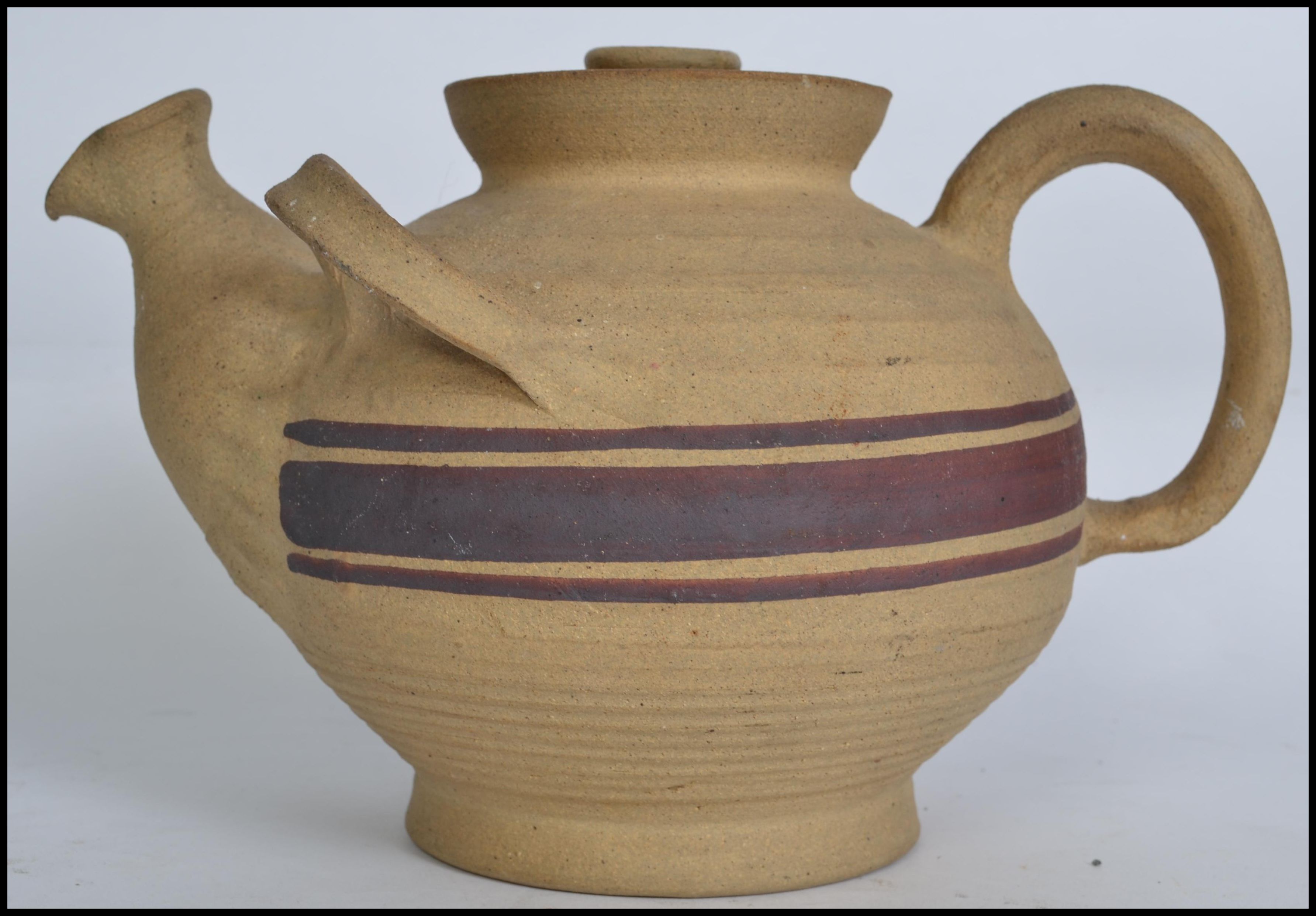 A vintage early 20th century studio art pottery teapot by Kahler Keramik of Denmark c1925 having