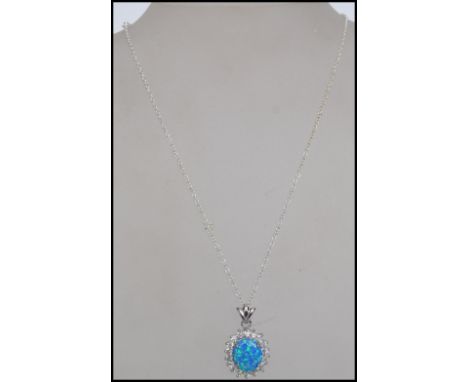 A large silver cluster cz and opal pendant and necklace chain, complete in the presentation box. Total weight 8.9g / size cha