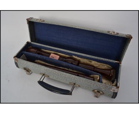 A vintage Dolmetsch Dolomite Tenor recorder complete in original fitted case.