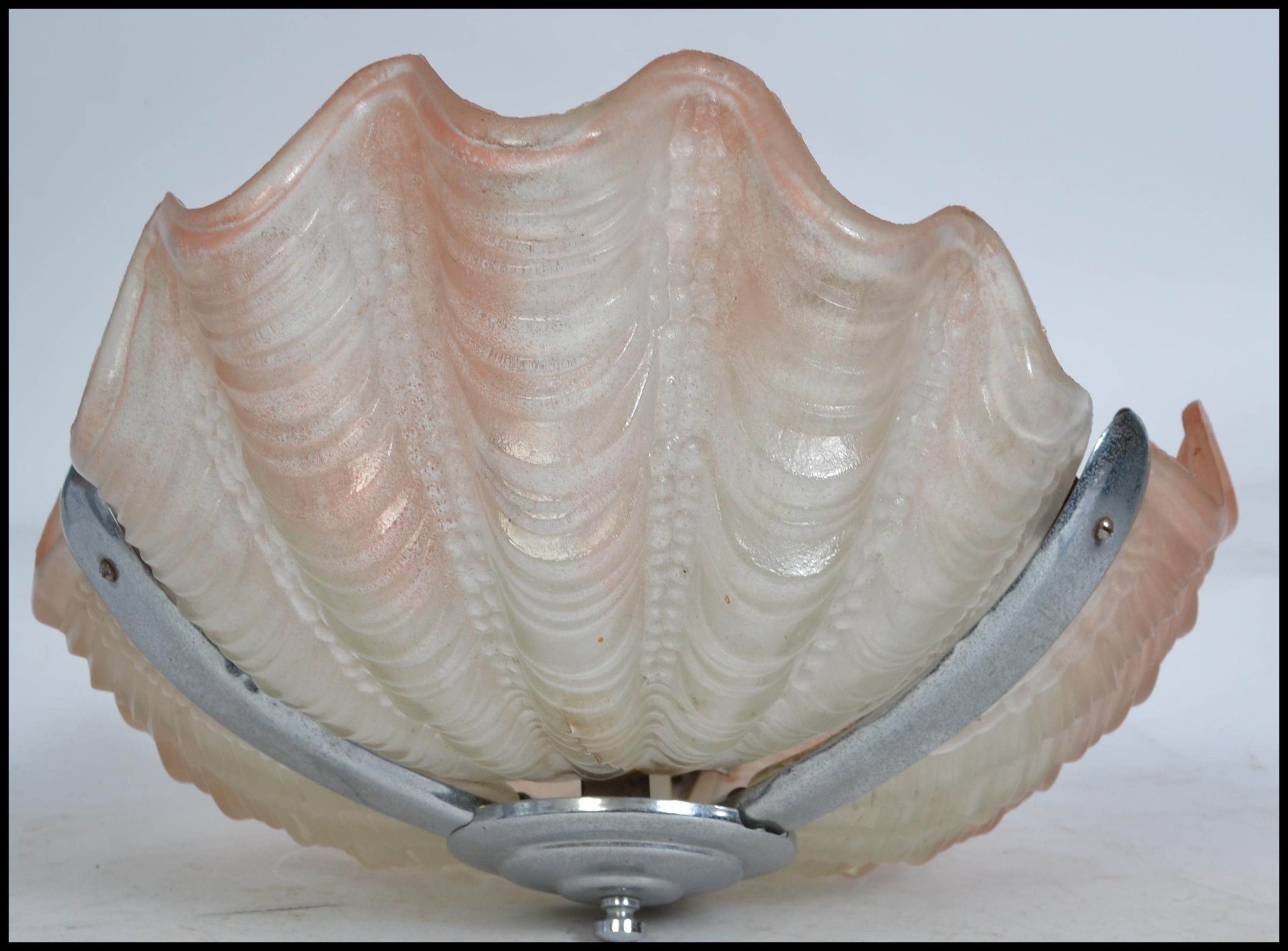 A 1930's Art Deco clam shell Odeon style ceiling light having white ...