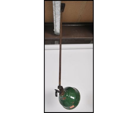 A vintage mid  20th century Industrial Maxlume enamel painted factory yard light in green and white colourway