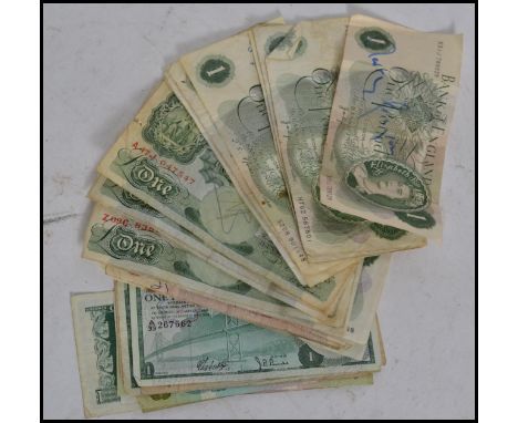 A collection of Vintage British bank notes, several pond notes of differing era's and 10 shilling notes. One of the notes bei