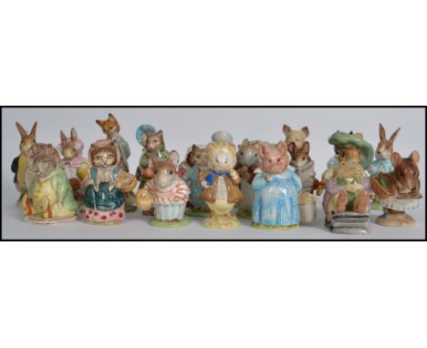A collection of Beatrix Potter Peter Rabbit ceramic figures 24 in total from makers such as Beswick to include Foxy Whiskered