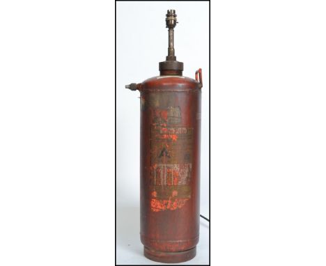 A stunning upcycled 20th century fire extinguisher having a retro conversion into a floor lamp fitted . Measures: 90cms high 