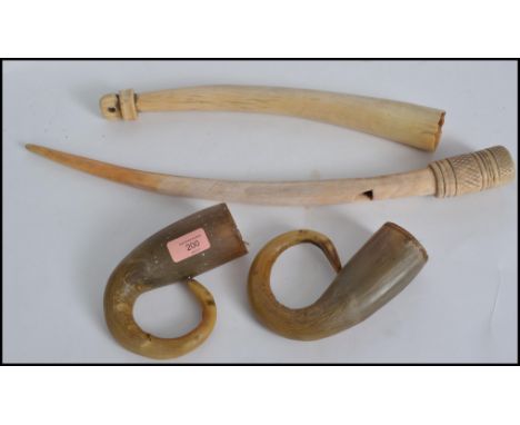 A pair of non matching 19th century worked Ivory tusks together with a pair of late 19th / early 20th century Anglo Indian to