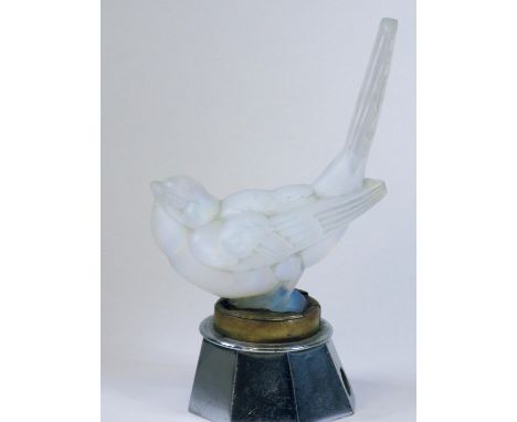 A Sabino Mockingbird Mascot.  Mounted on a brass and chromium-plated illumination base, (light-fitting missing) the genus of 