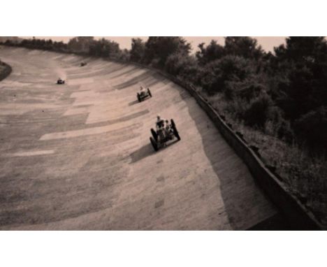 A Photograph Album by K. Mummerey.  An assortment of images, racing at Brooklands 1937  with K Evans, Bira in a Maserati, ERA