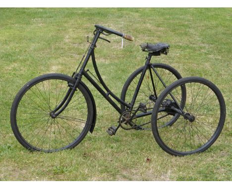 A c1900 Lady's Loop Frame Tricycle.  Believed manufactured by Humber &amp; Co., a black-painted tricycle with a 20-inch frame