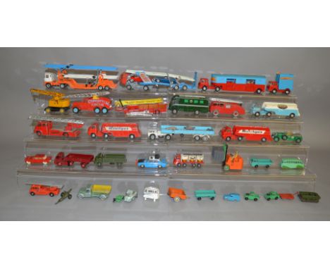 A mixed lot of playworn diecast by Corgi and Dinky, which includes; articulated horsebox, International Truck etc.