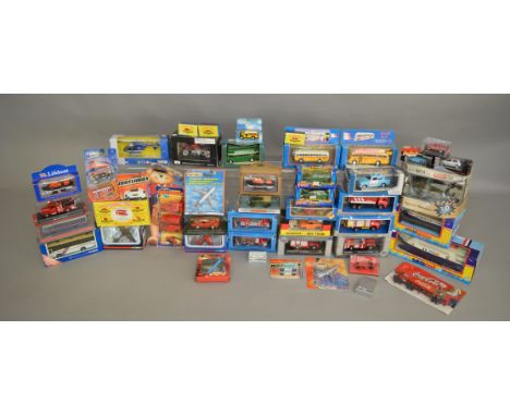 A good quantity of boxed and carded, mostly diecast models in a variety of different scales by Corgi, Matchbox, Cararama and 