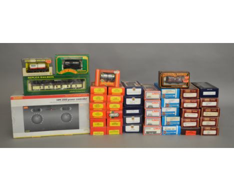 OO Gauge. A good quantity of boxed Rolling Stock by Hornby, Lima, Airfix etc, comprising of 13 carriages and 28 items of Roll