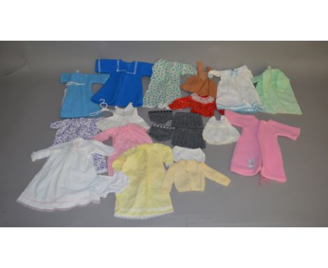 A varied selection of vintage items including, dolls clothing for Sasha and similar size dolls,&nbsp; rare Mattel 'The Sunshi