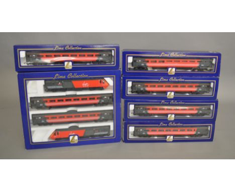 OO Gauge. A boxed Lima L149859 Virgin Cross Country Set together with 5 boxed lima Virgin Coaches, L305406/7, L305420/1/2. Al