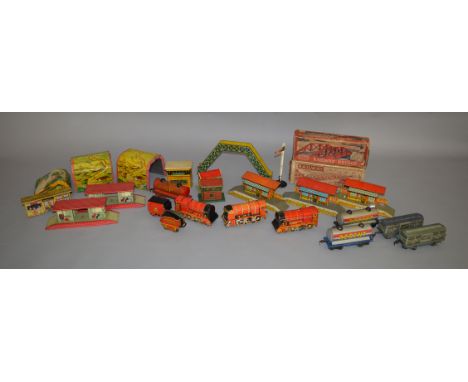 O Gauge. An assortment of tinplate Locomotives, Rolling Stock and Accessories by Wells Brimtoy, Mettoy etc. including some bo