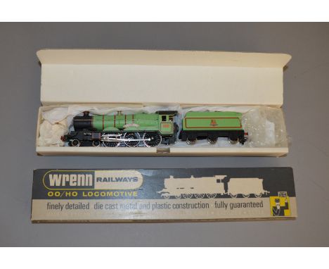 A boxed Wrenn Locomotive, W2221 (B) 4-6-0 Brecon Castle 5023 in BR experimental light green livery, overall appears G+ boxed.