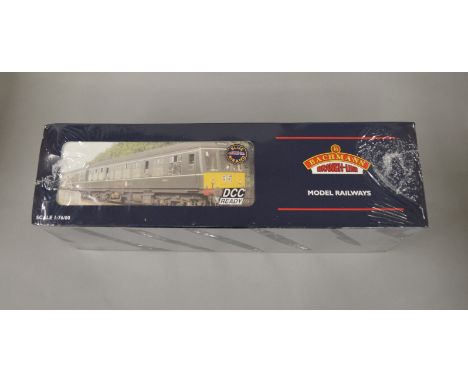 OO Gauge. A boxed Bachmann 32-911 Class 108 3 car DMU BR green with yellow warning panels, still shrink wrapped, E boxed.