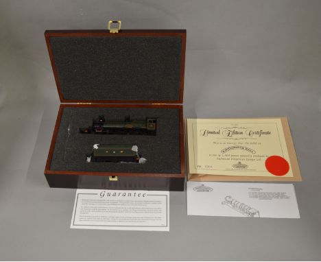 OO Gauge. A Bachmann Hall Class Locomotive model with Tender housed in a wooden case, GW green 'Raveningham Hall 6960', with 